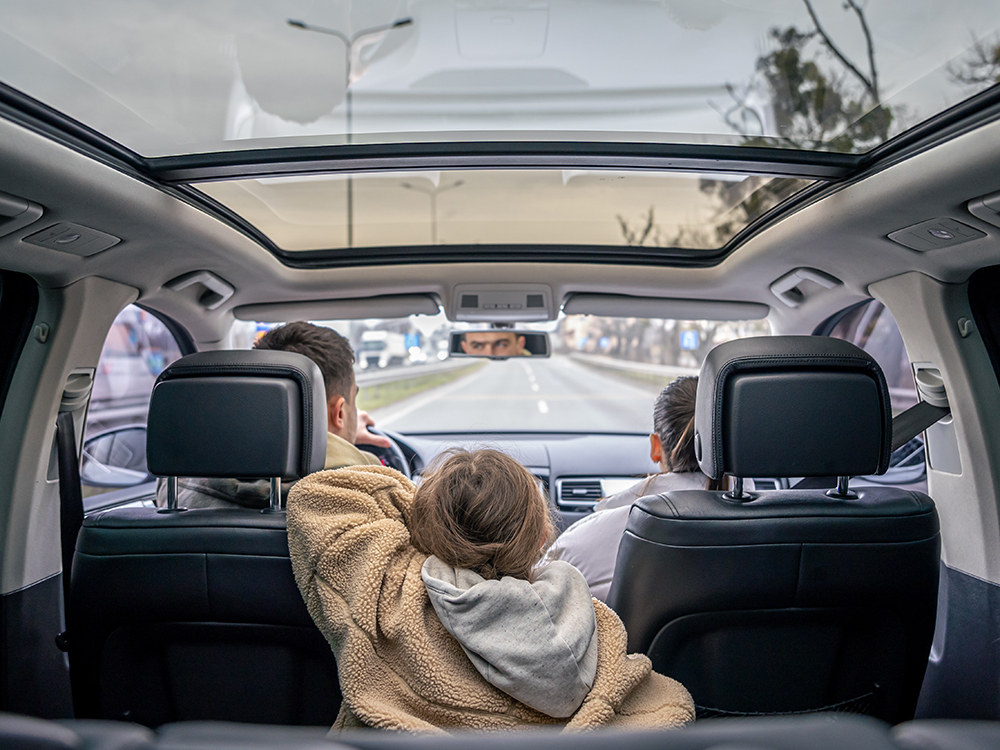 kid in rear view mirror